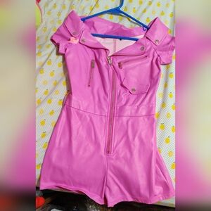Pink faux leather jumpsuit size small with tear in right sleeve